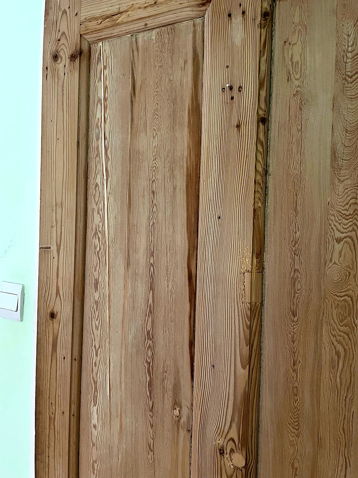 Split door panels repaired with flexible filler