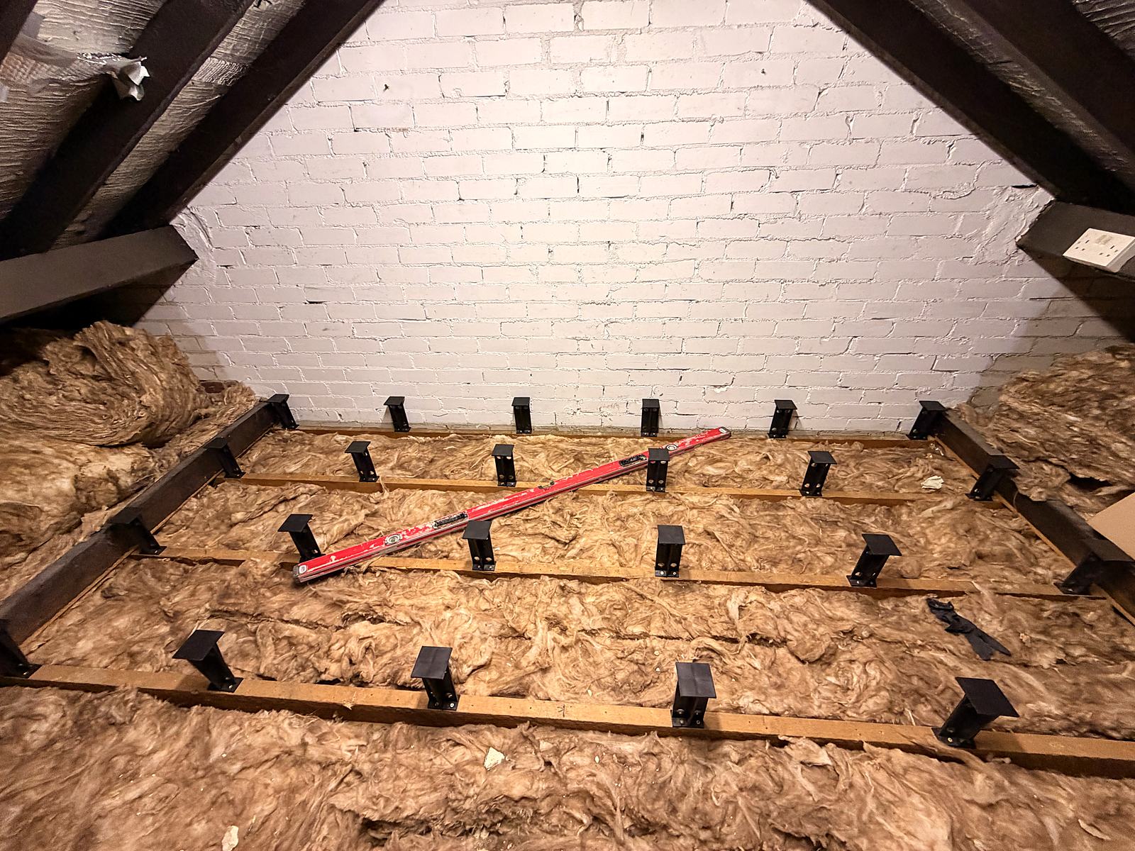 Raised loft floor on loft legs