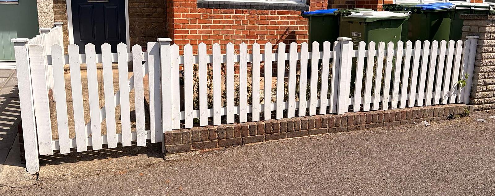 Picket fence: new pickets made, fitted and painted